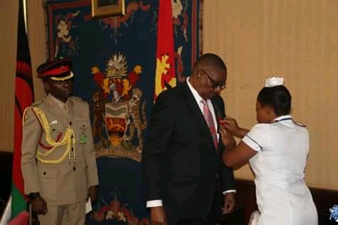 Mutharika launches poppy flower week: buys one at 1 million kwacha